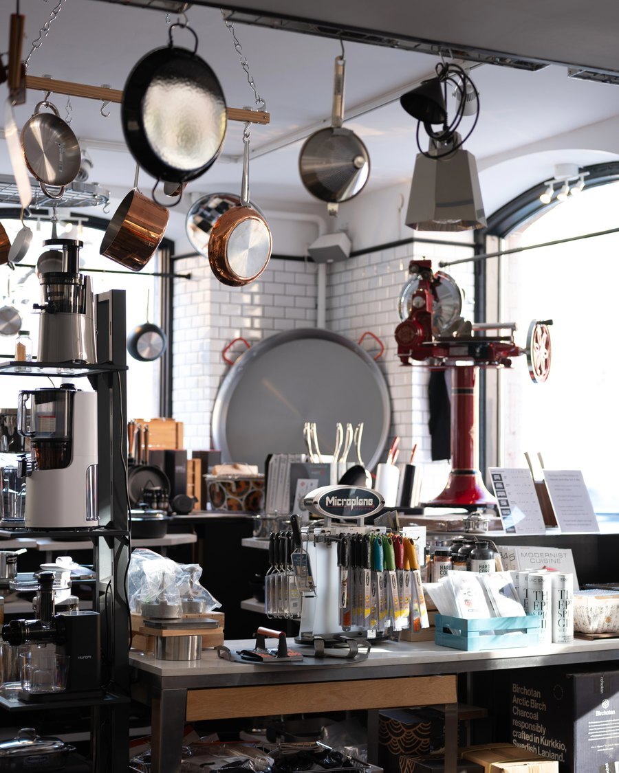 Inside a KitchenLab store with copper pans and cookware