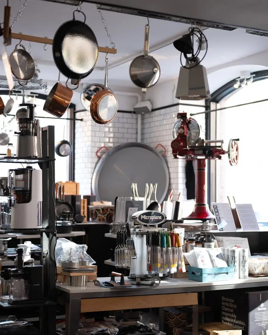 Inside a KitchenLab store with copper pans and cookware