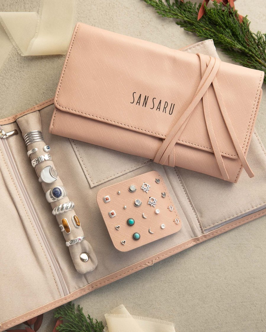 San Saru jewelry roll with silver rings and earrings